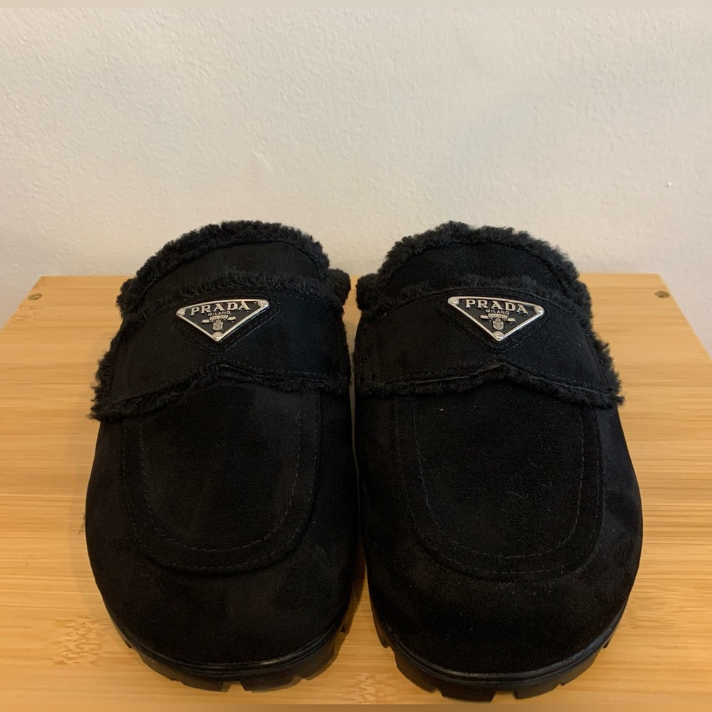 Prada black suede and shearling mules